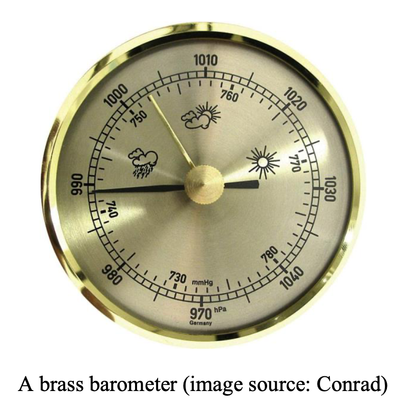 A brass barometer.