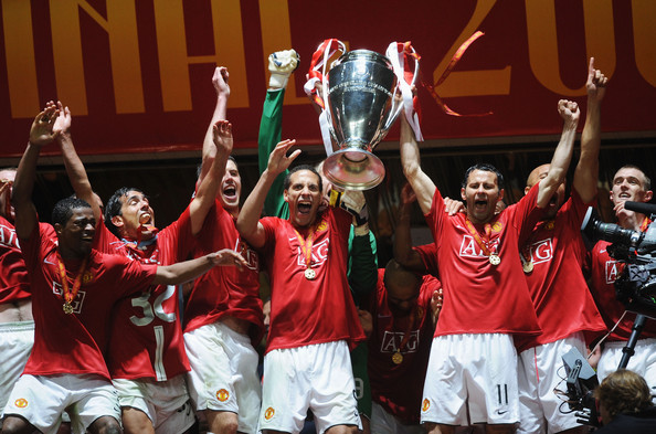 Manchester United players with their UEFA Champions League trophy