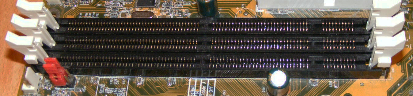 Three DIMM slots on a computer motherboard used for increasing the amount of available RAM. Credit: Wikimedia.org