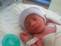 This baby was born at 32 weeks and only weighed 2 pounds and 15 ounces.^[Photo by Jennifer Paris used with permission]