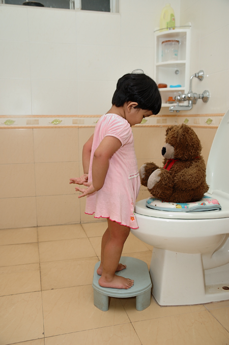 A child learning to be toilet trained.^[[Image](https://www.flickr.com/photos/bansal98/4626893485) by [Manish Bansal](https://www.flickr.com/photos/bansal98/) is licensed under [CC-BY-2.0](https://creativecommons.org/licenses/by/2.0/)]