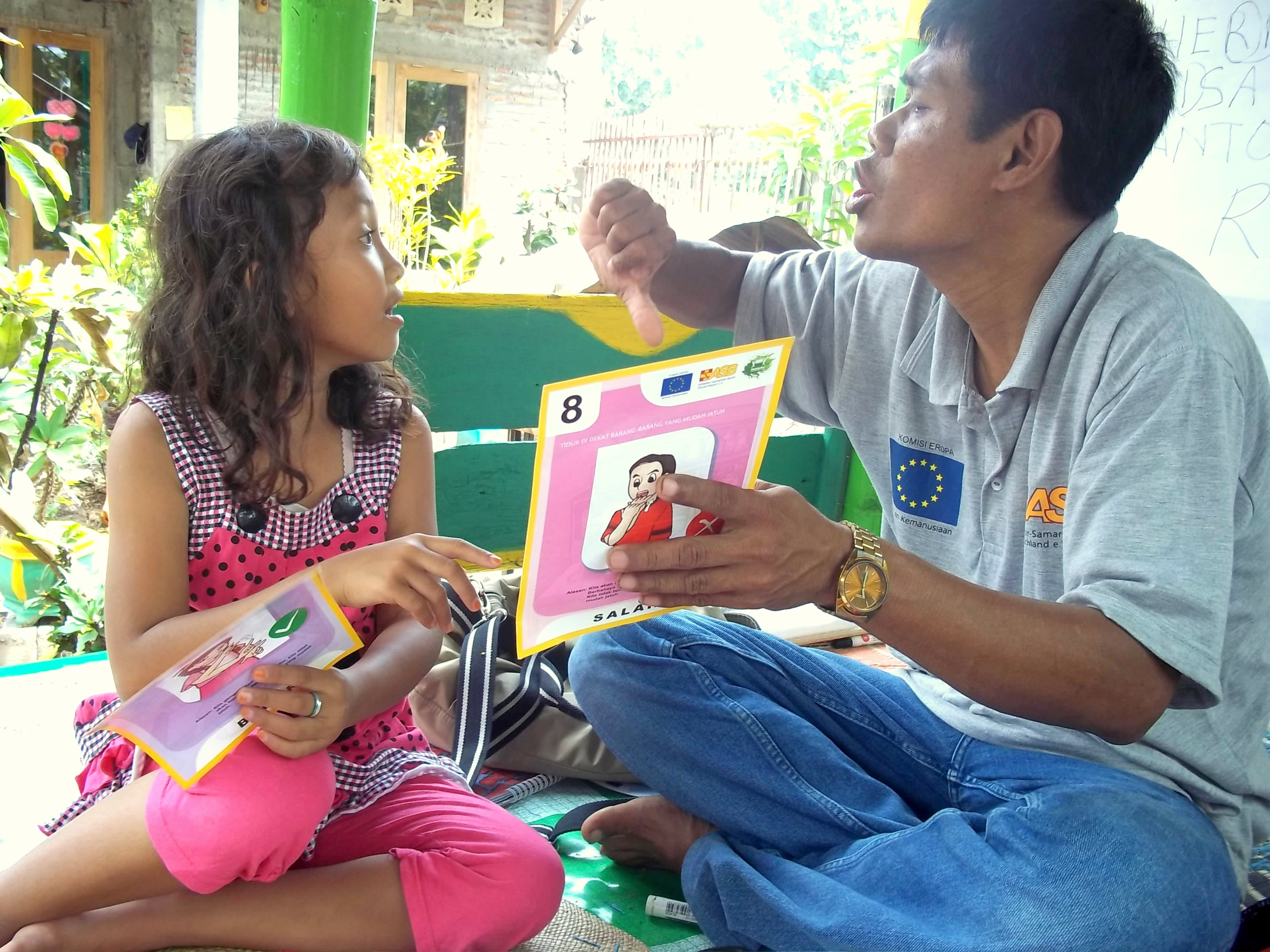 Speech therapy.^[[Image](https://www.flickr.com/photos/eu_echo/8079181602) by [EU Civil Protection and Humanitarian Aid Operations](https://www.flickr.com/photos/eu_echo/) is licensed under [CC BY-SA 2.0](https://creativecommons.org/licenses/by-sa/2.0/)]