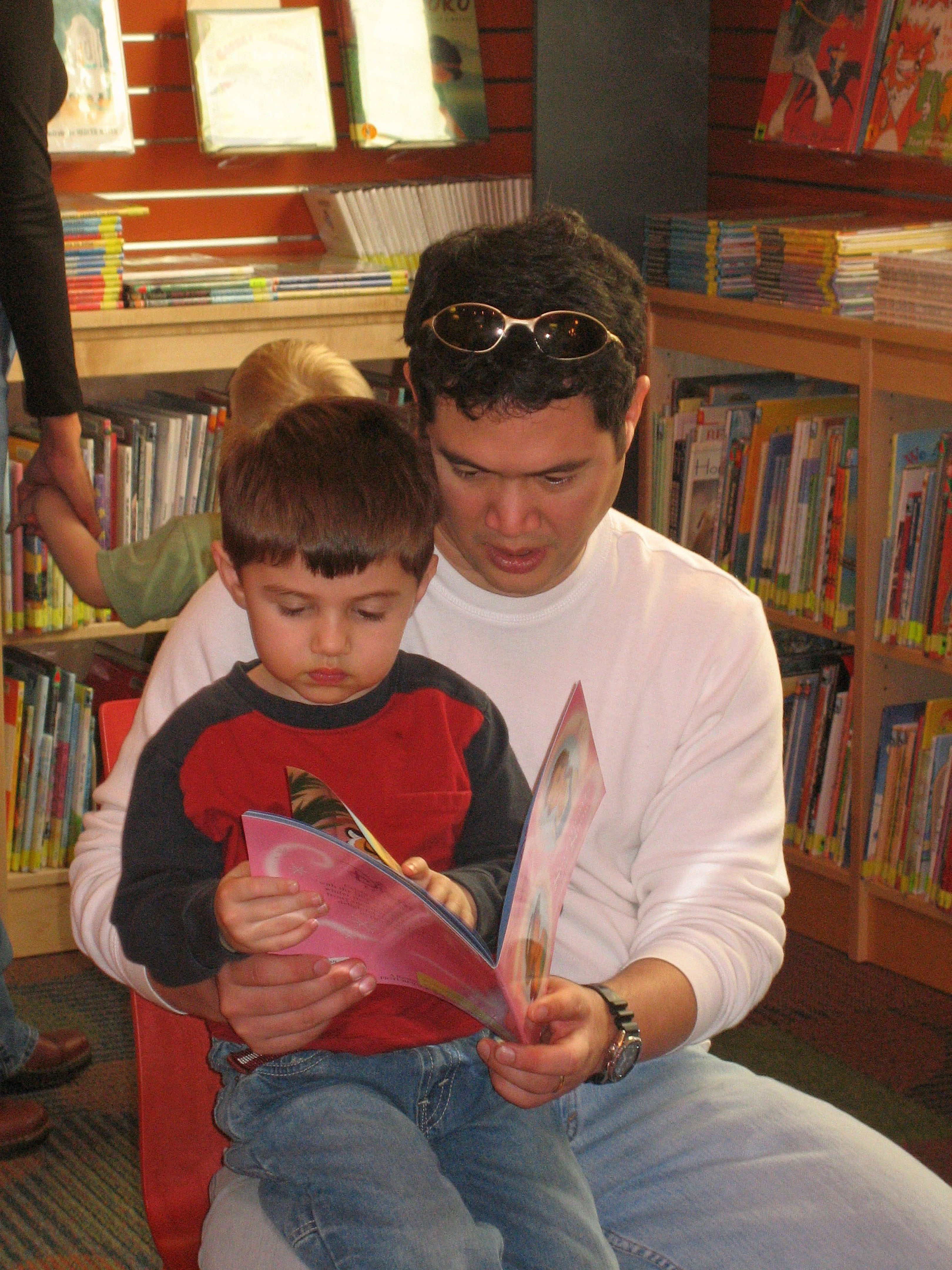 When children grow up to love reading, may have been influenced by the positive experiences of being read to in their families.^[[Image](https://www.flickr.com/photos/sanjoselibrary/2925237508) by [San José Public Library](https://www.flickr.com/photos/sanjoselibrary/) is licensed under [CC BY-SA 2.0](https://creativecommons.org/licenses/by-sa/2.0/)]
