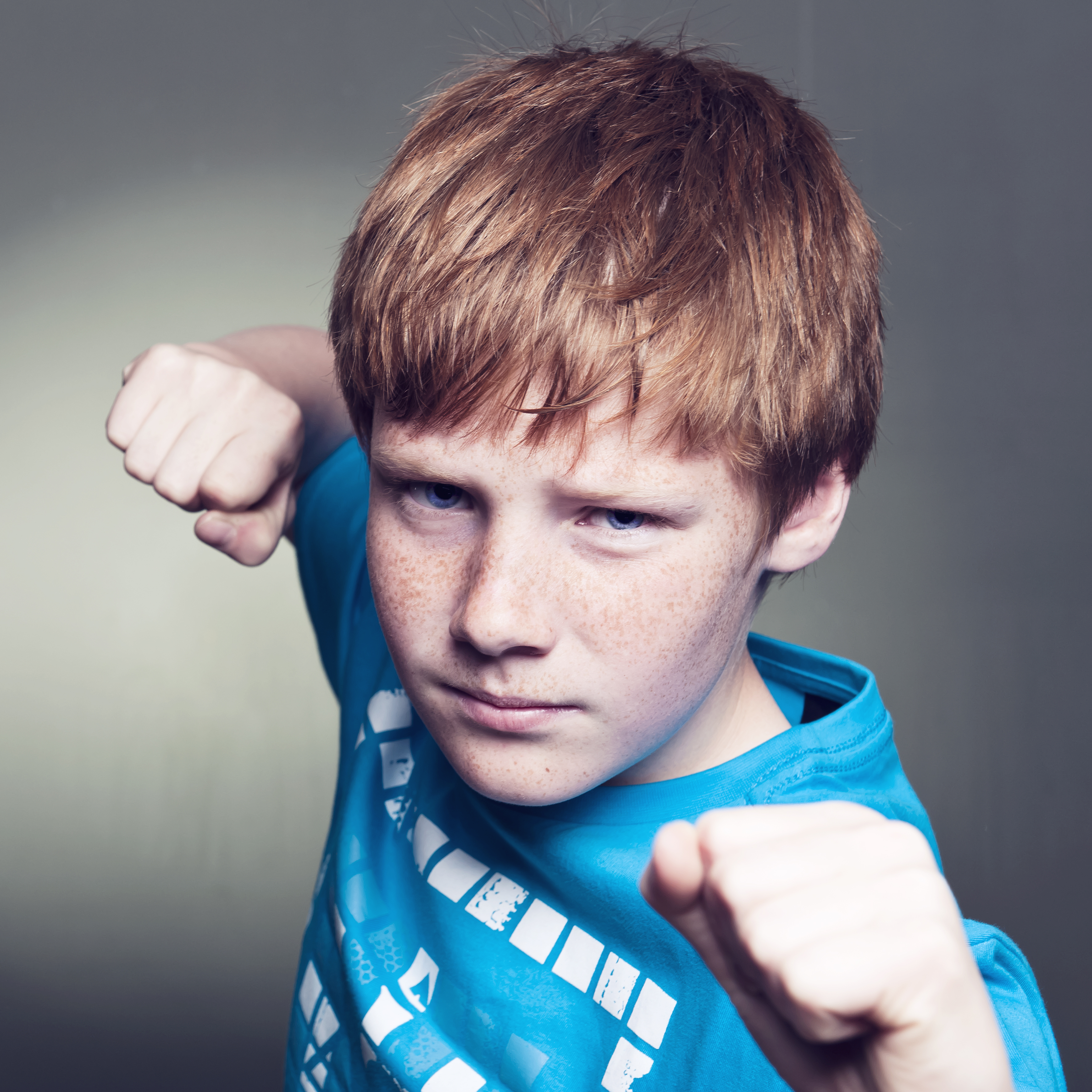 This boy is threatening physical aggression.^[[Image](https://www.flickr.com/photos/34547181@N00/5653340435/) by [Philippe Put](https://www.flickr.com/photos/34547181@N00/) is licensed under [CC BY 2.0](https://creativecommons.org/licenses/by/2.0/)]