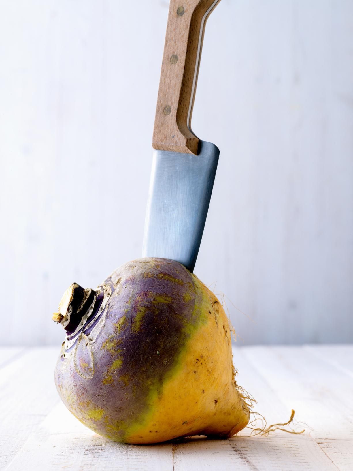 Slicing and dicing data. The turnip represents your data, and the knife represents indexing with brackets, or subsetting functions like subset(). The red-eyed clown holding the knife is just off camera.